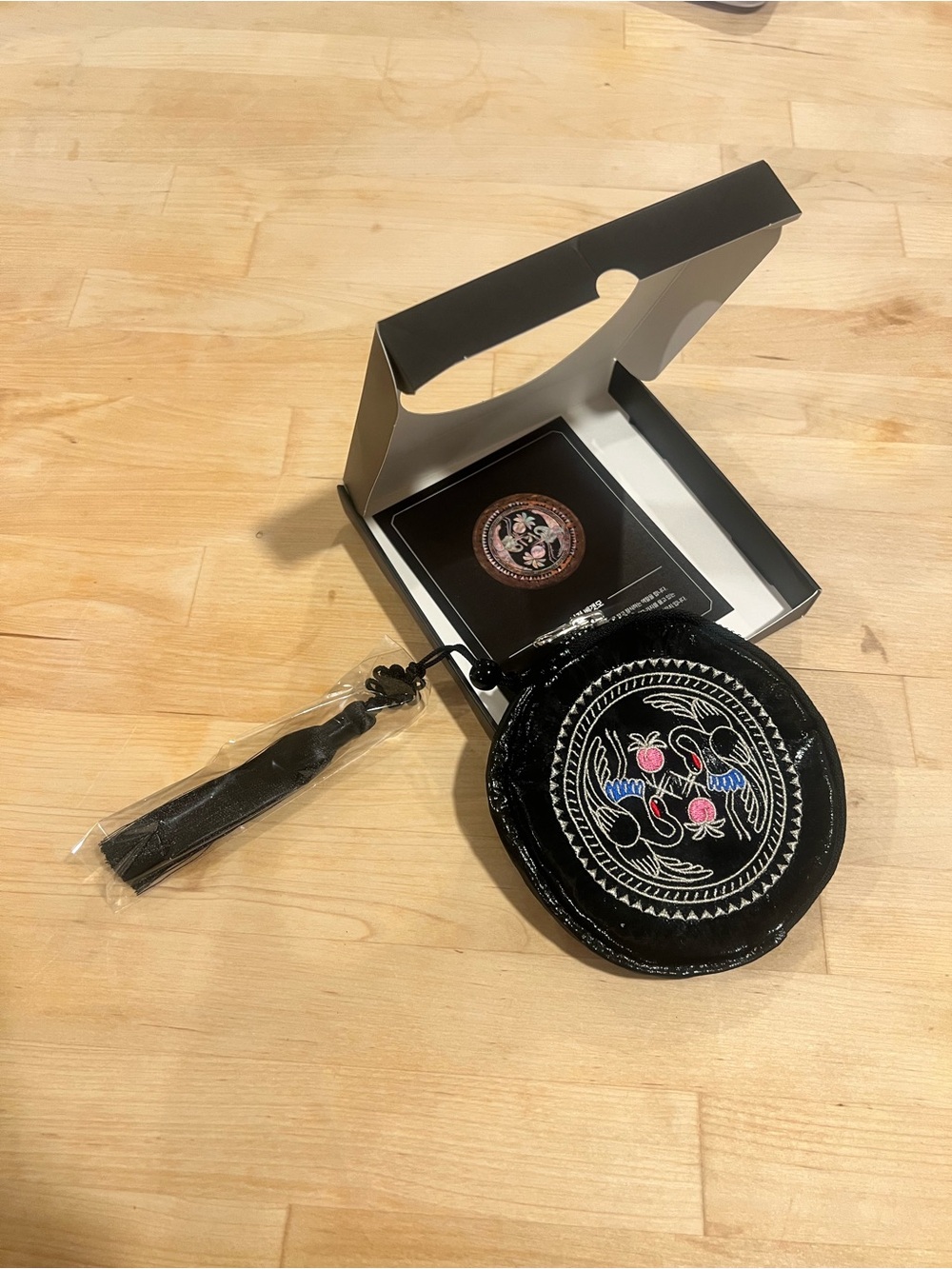 Black Embroidered Round Wristlet Pouch with Tassel